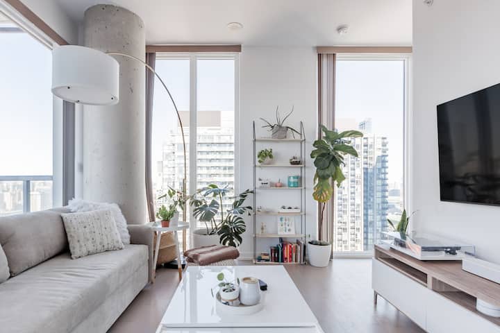 Downtown Toronto skyline with short-term rental properties under AVS Hospitality management. Airbnb Management