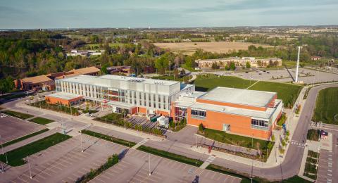 Aerial view of King Township Ontario showcasing multiplex rental properties and green landscapes. King Property Management.