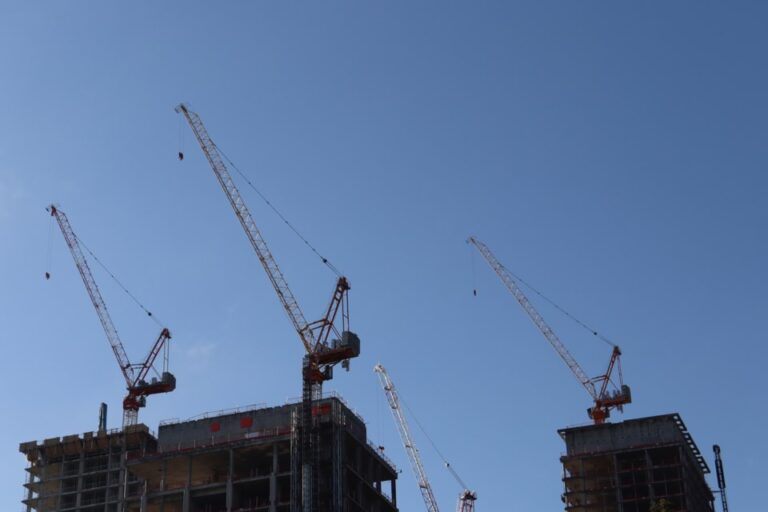Modern low-rise Toronto multiplex development beside a subway station illustrating new transit-oriented zoning opportunities